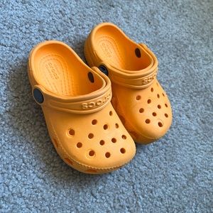 Toddler size 7 orange crocs